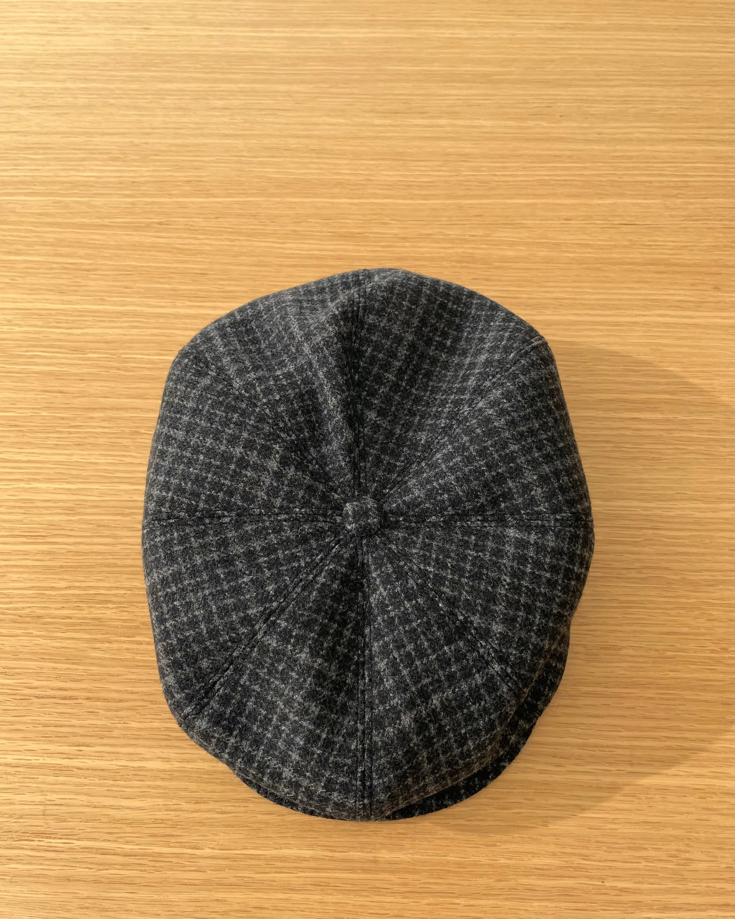 Peaked Cap in Window Pane